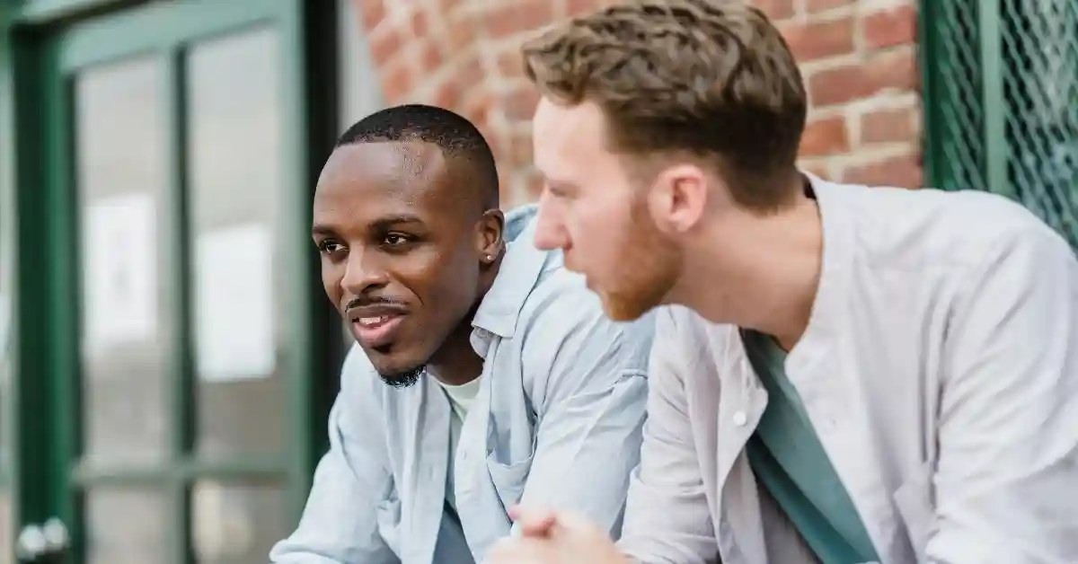 Two people talking together, offering support for personality disorder